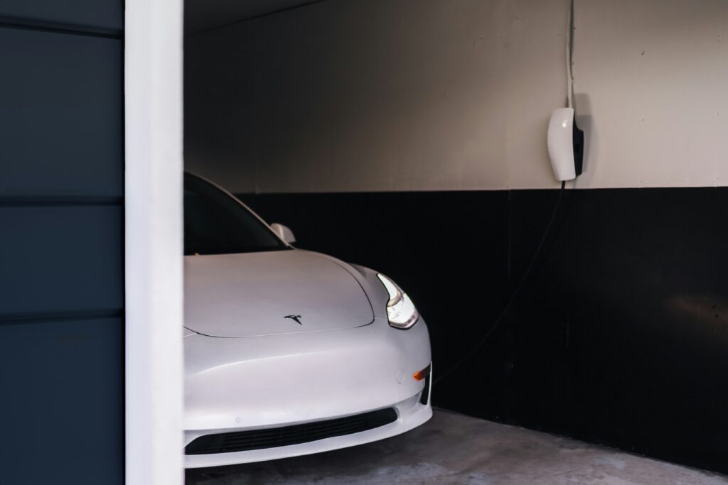 EV charger installed in a residential garage with clean wiring