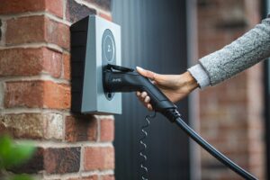 Side-view of a home with an EV charger and conduit installed cleanly