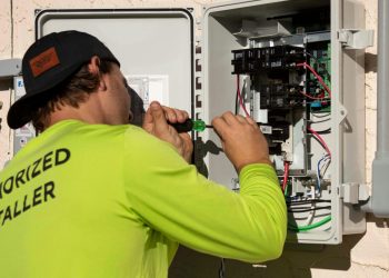 residential-service-panel-upgrade-conduit.jpg Upgraded service panel with metal conduit in a Portland residence